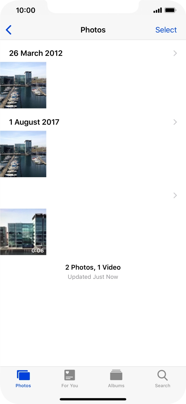 Go to the required folder and press the required picture or video clip.