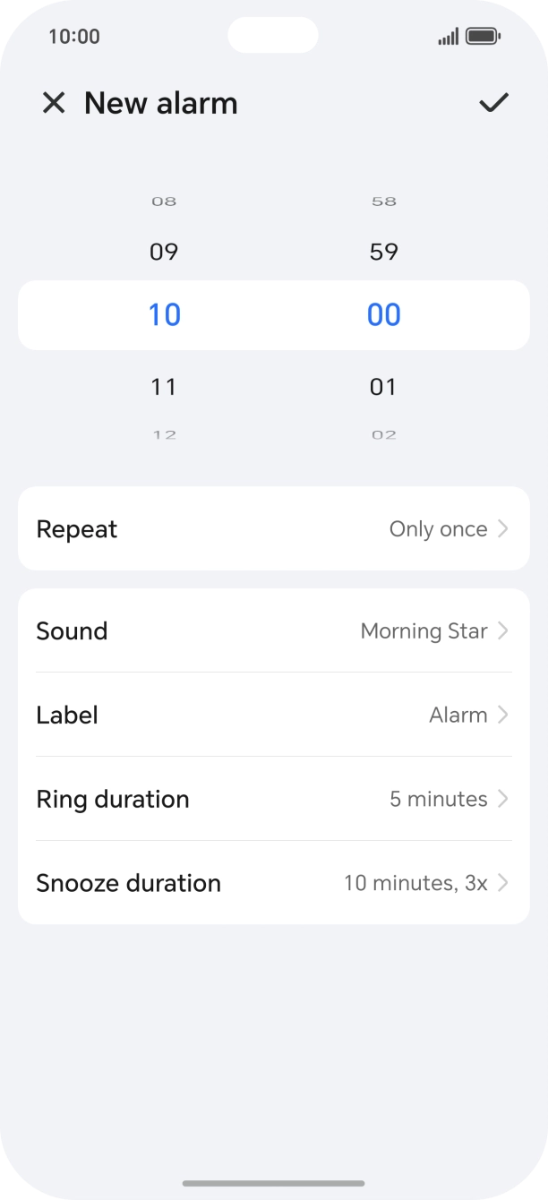 Slide your finger up or down on the hour and minute numbers to set the required alarm time.