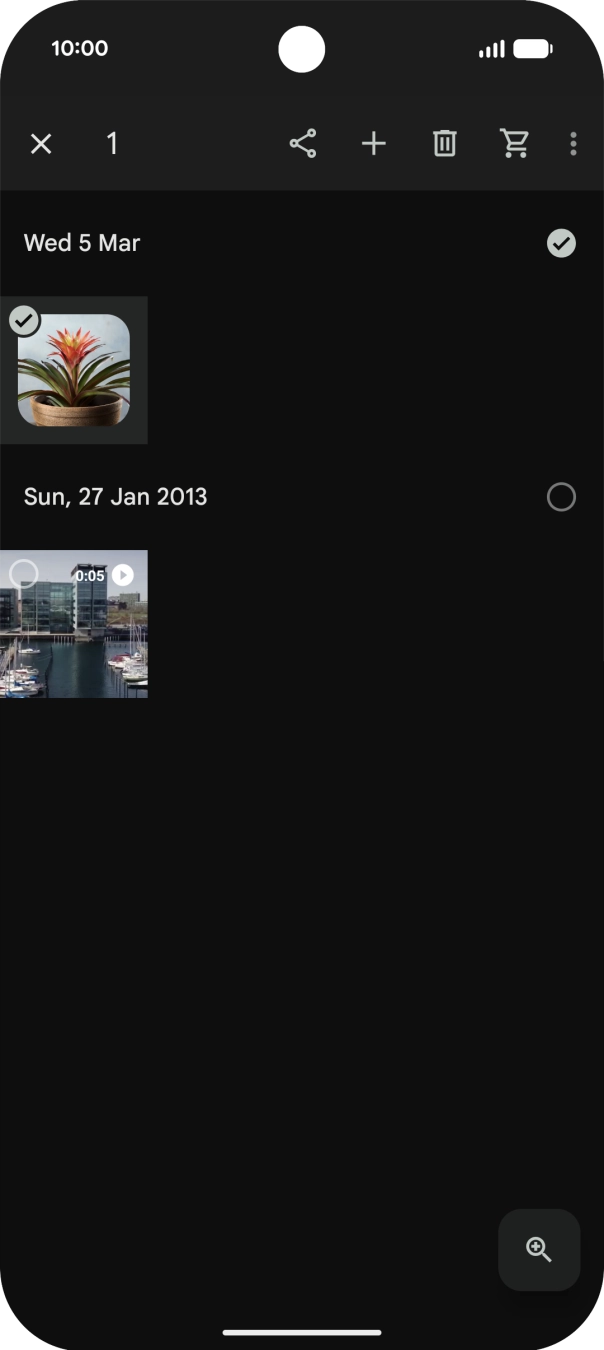 Press the required pictures or videos to select them.