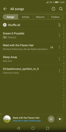 Press the song title at the bottom of the screen.