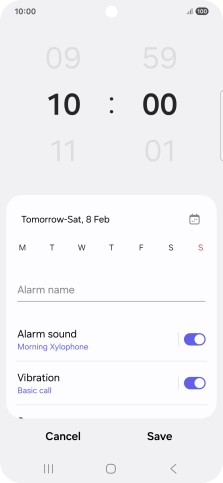 Slide your finger up or down on the hour and minute numbers to set the required alarm time.
