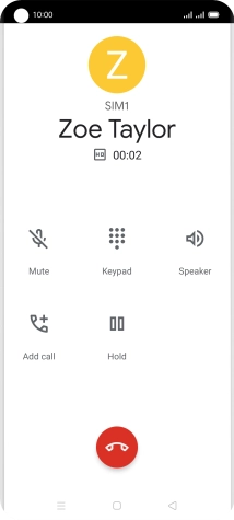 Press the end call icon.