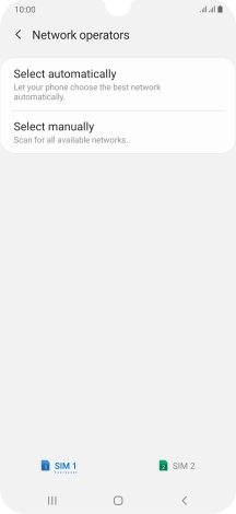 Press Select manually and your phone will search for networks.