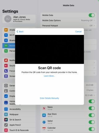 Place the QR code you've received inside the tablet camera frame to scan the code.