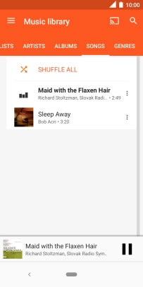 Press the song title at the bottom of the screen.