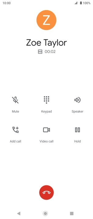 Press the end call icon.