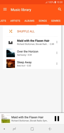 Press the song title at the bottom of the screen.