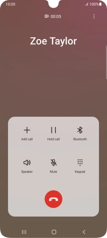 Press the end call icon.