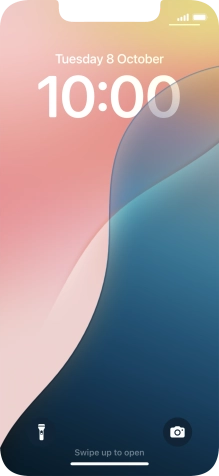 Press and hold anywhere on the lock screen.