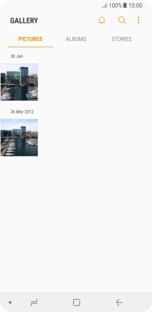 Press ALBUMS and go to the required folder.