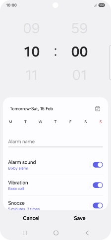 Slide your finger up or down on the hour and minute numbers to set the required alarm time.