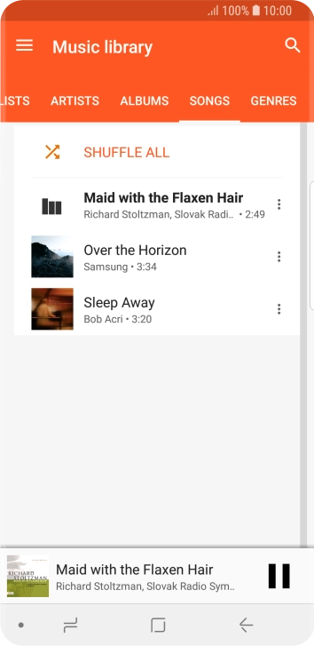 Press the song title at the bottom of the screen.