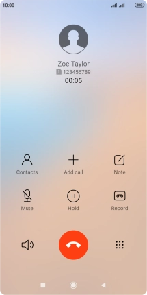 Press the end call icon.