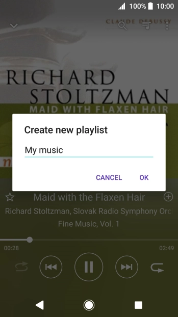 Key in a name for the playlist and press OK.
