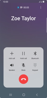 Press the end call icon.