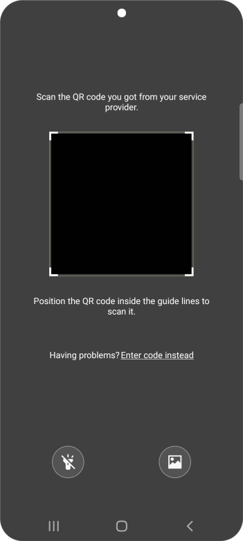 Place the QR code you've received inside the phone camera frame to scan the code.