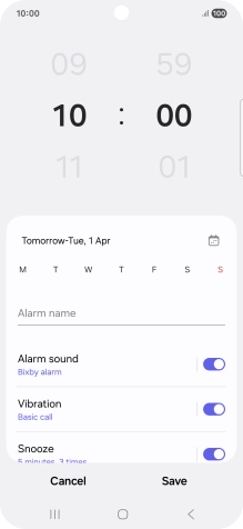 Slide your finger up or down on the hour and minute numbers to set the required alarm time.