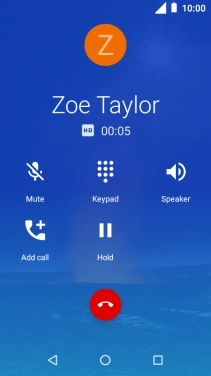 Press the end call icon.
