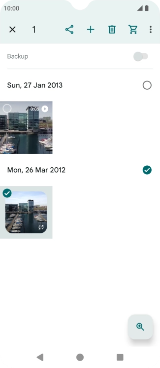 Press the required pictures or videos to select them.