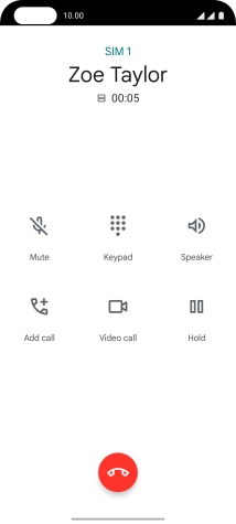 Press the end call icon.