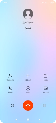 Press the end call icon.