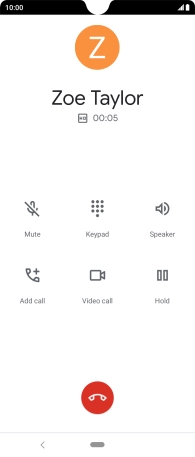 Press the end call icon.