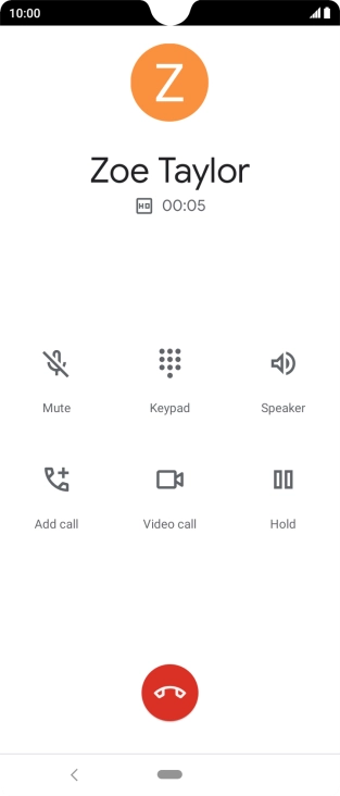 Press the end call icon.