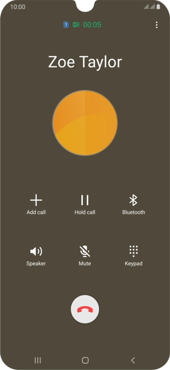 Press the end call icon.