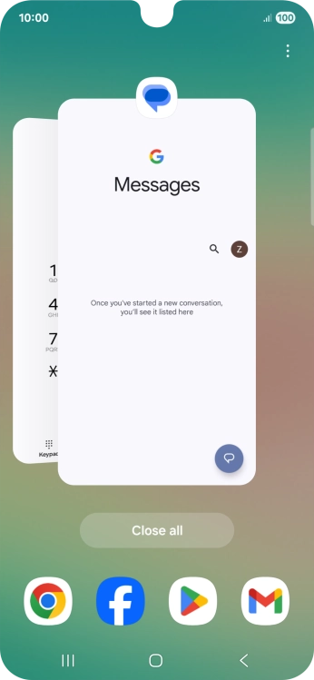 Press the first application and drag it to the top or bottom of the screen.