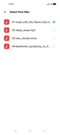 Once you've found a ring tone you like, press the Return key.