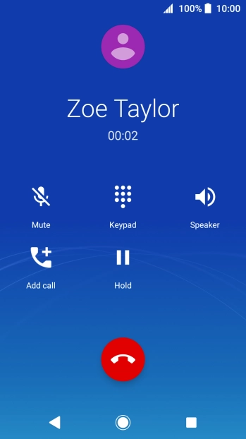 Press the end call icon.