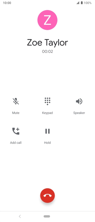 Press the end call icon.