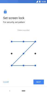 Slide your finger across the screen to connect at least four points and press NEXT.