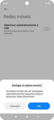Prima OK e aguarde enquanto o telefone procura as redes.