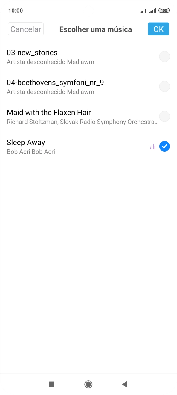 Quando tiver encontrado o tom de toque que pretende, prima OK.