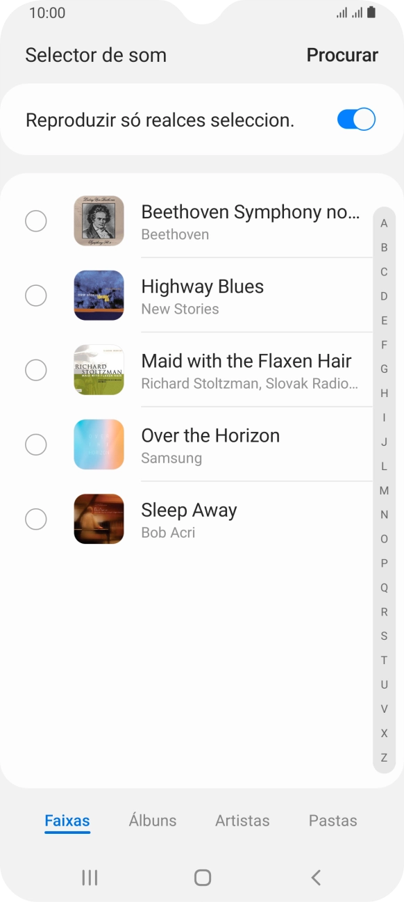 Prima os tons de toque pretendidos para os ouvir.