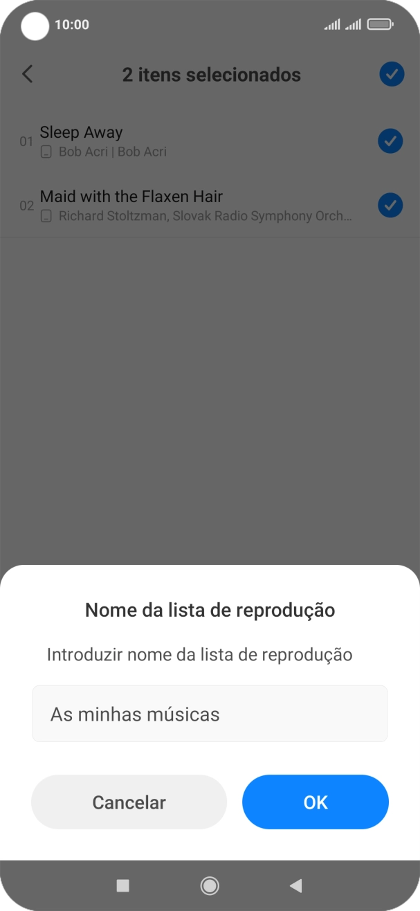 Introduza o nome pretendido para a lista de reprodução e prima OK.