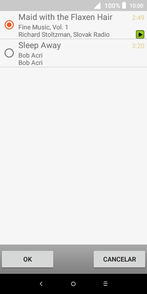 Quando tiver encontrado o tom de toque que pretende, prima OK.