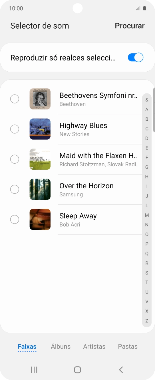Prima os tons de toque pretendidos para os ouvir.