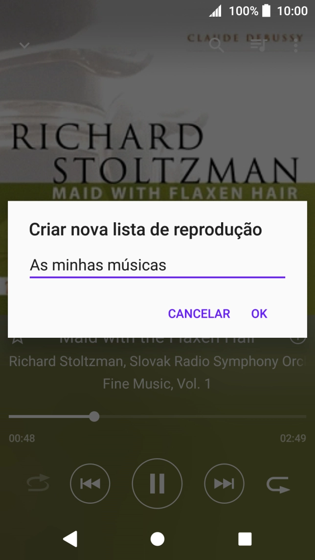 Introduza o nome pretendido para a lista de reprodução e prima OK.