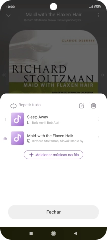 Prima o ícone de lista de reprodução.