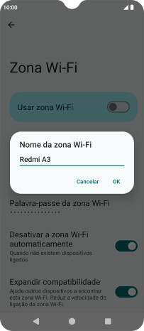 Introduza o nome pretendido do hotspot Wi-Fi e prima OK.