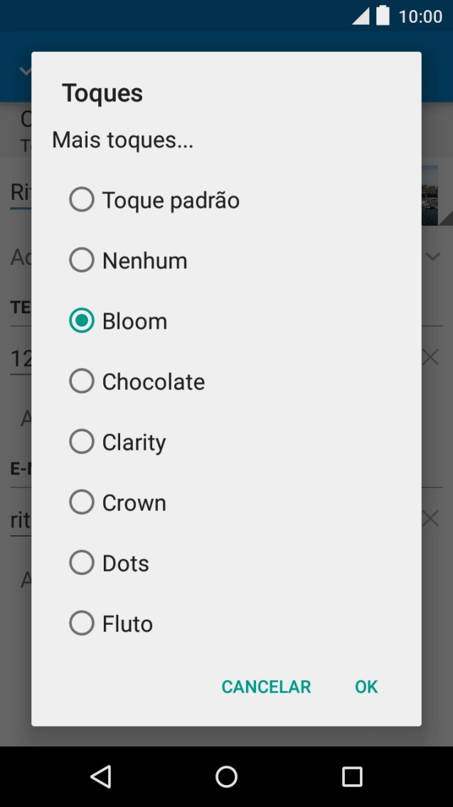 Quando tiver encontrado o tom de toque que pretende, prima OK.