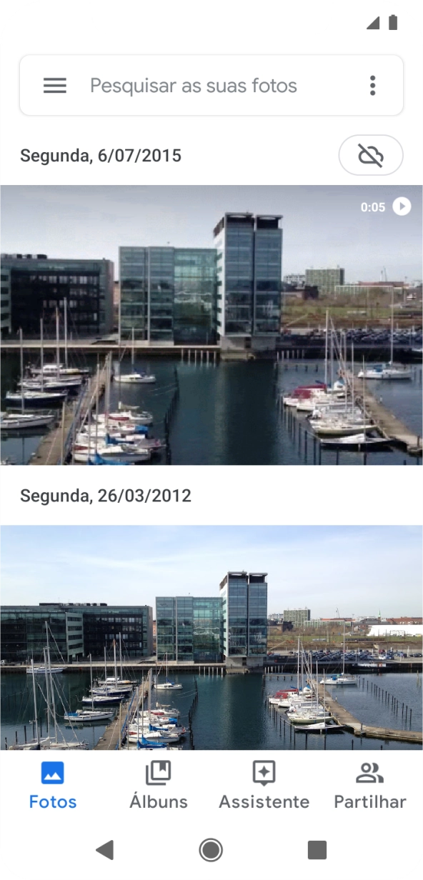 Prima Álbuns e vá até à pasta pretendida.