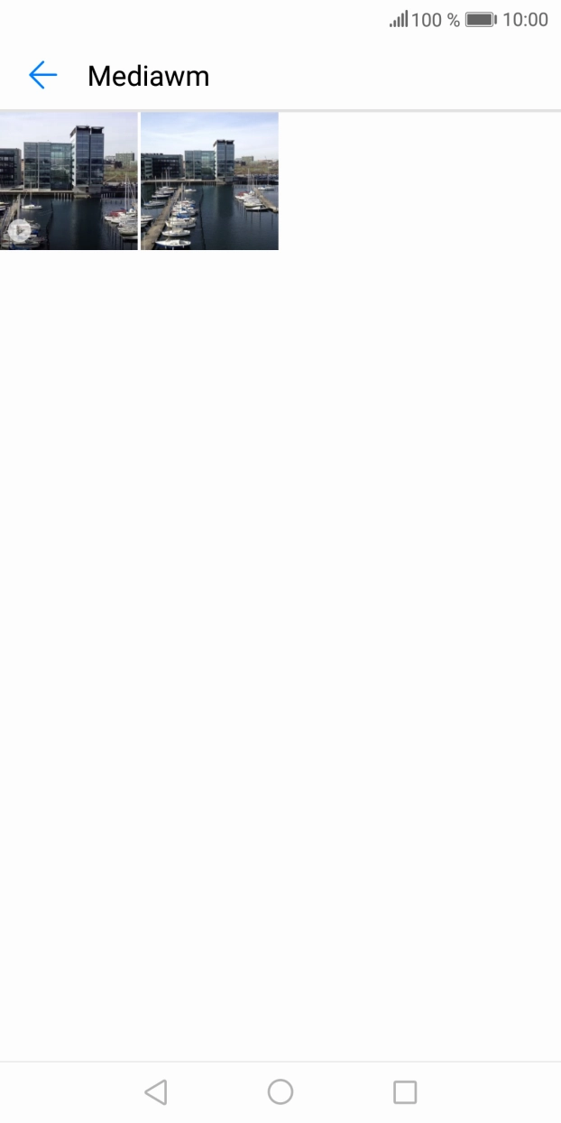 Prima durante um momento a imagem ou o clipe de vídeo pretendido.