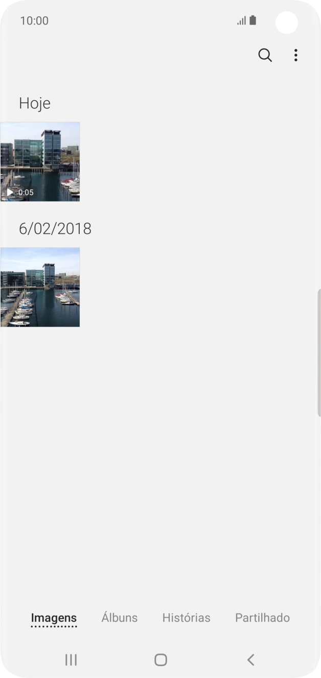 Prima Álbuns e vá até à pasta pretendida.