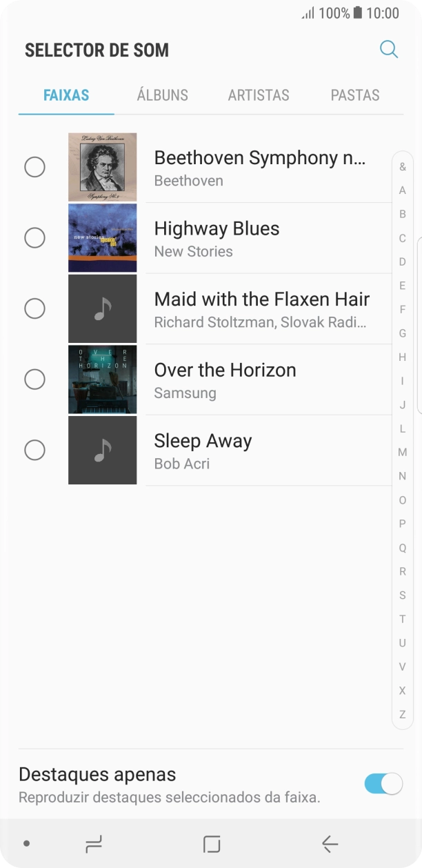 Prima os tons de toque pretendidos para os ouvir.
