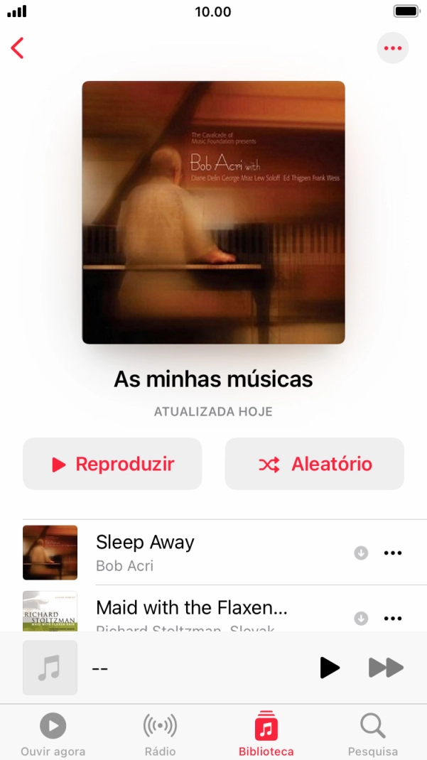 Vá até à categoria ou lista de reprodução pretendida e prima o ficheiro de música pretendido.