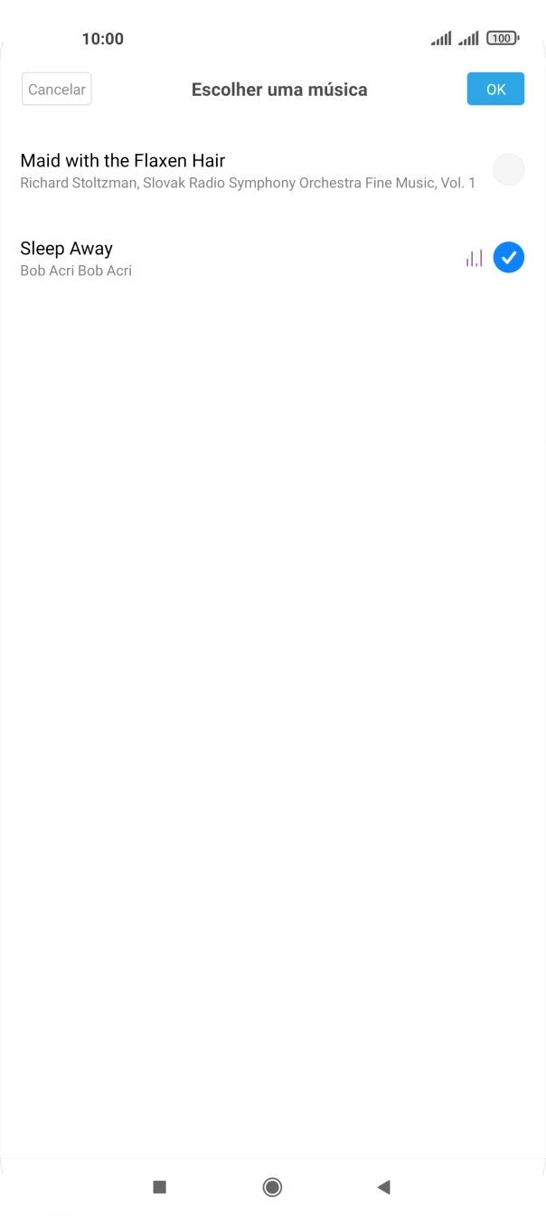 Quando tiver encontrado o tom de toque que pretende, prima OK.