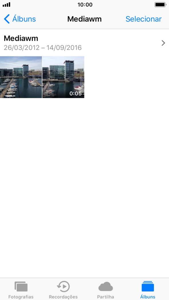 Prima firmemente a imagem pretendida até aparecer um menu no ecrã.